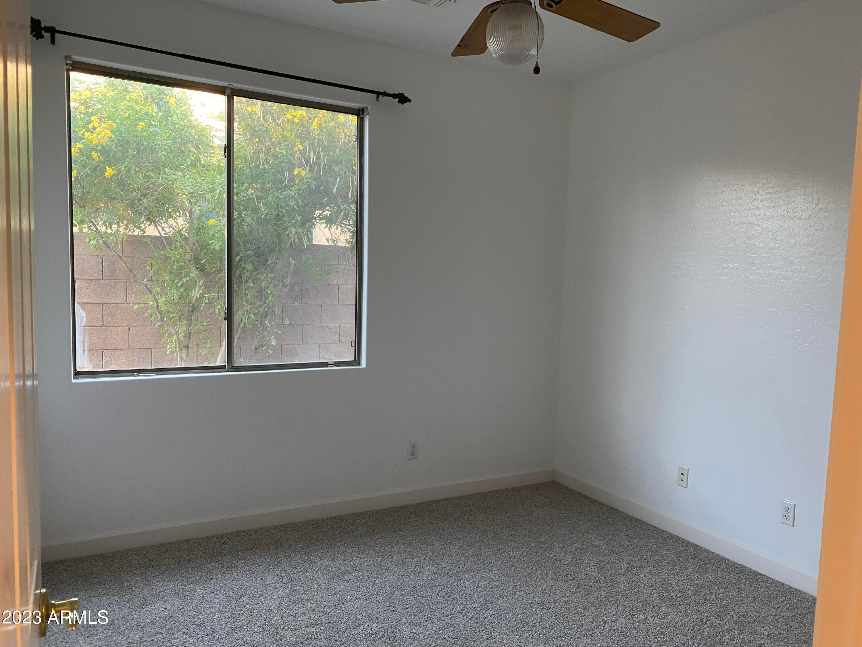 232 West Hawk Way Chandler, AZ 85286 - Photo 4 of 16 an empty room with a window