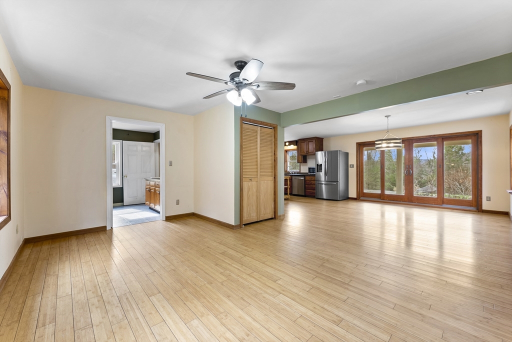 147 Worthington Road Huntington, MA 01050 - Photo 14 of 39 a view of an empty room with window and wooden floor