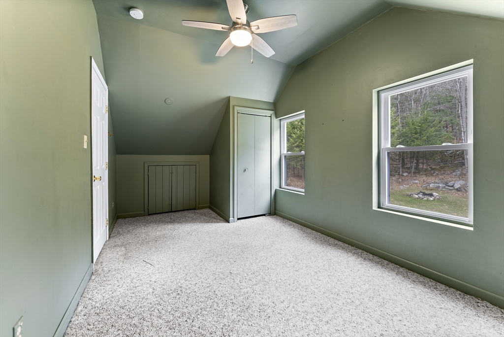 147 Worthington Road Huntington, MA 01050 - Photo 17 of 39 an empty room with windows and fan