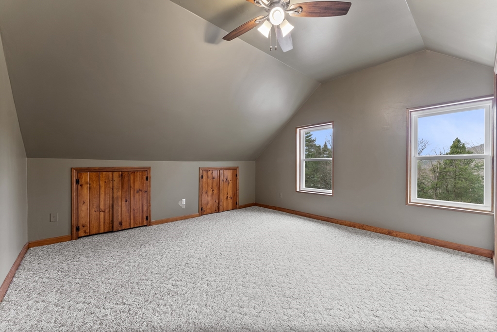 147 Worthington Road Huntington, MA 01050 - Photo 20 of 39 a view of an empty room with windows