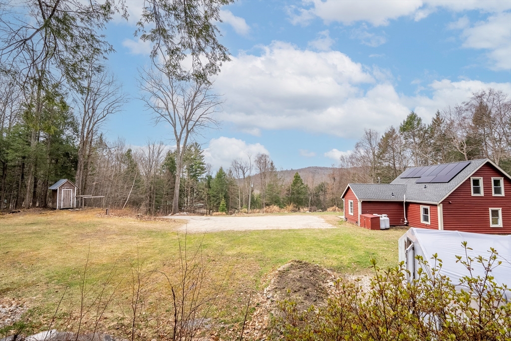 147 Worthington Road Huntington, MA 01050 - Photo 2 of 39 a view of a house with a yard