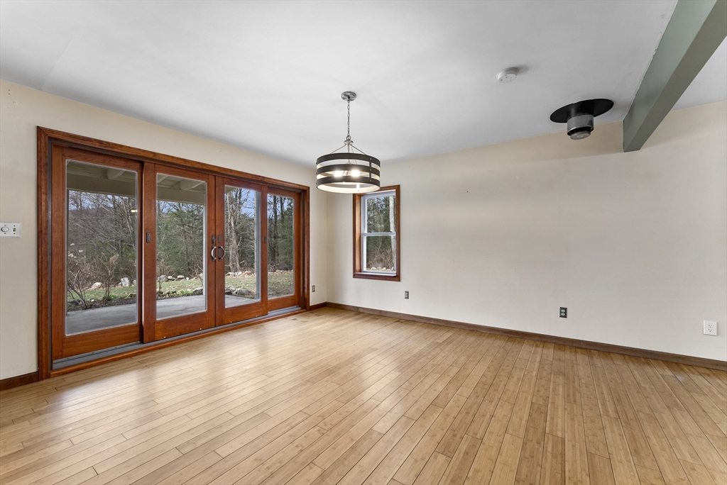 147 Worthington Road Huntington, MA 01050 - Photo 9 of 39 a view of an empty room with glass door