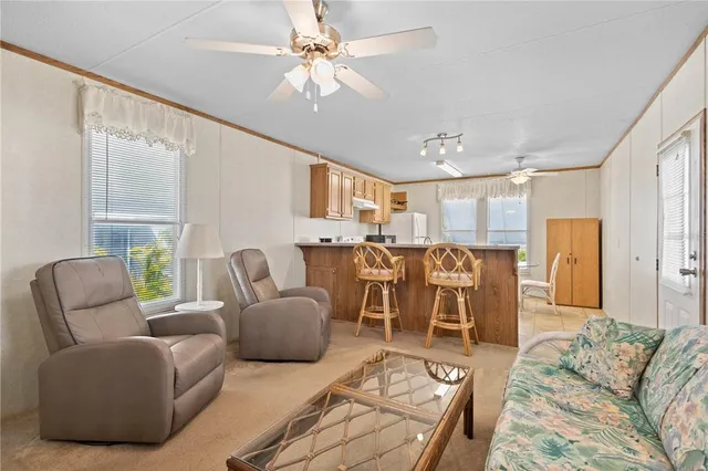 a kitchen with a sink cabinets and appliances
