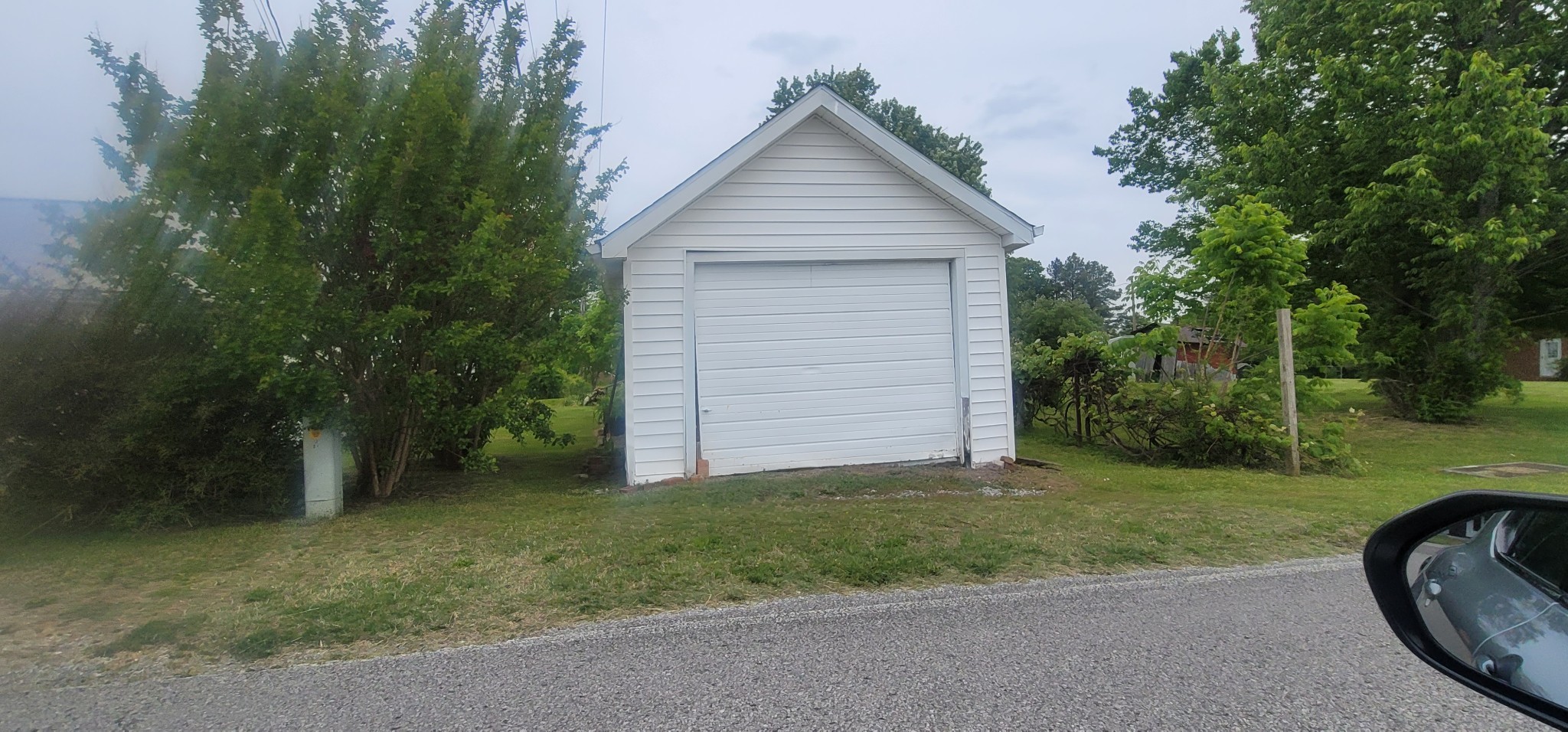19 Turkey Scratch Road Spencer, TN 38585 - Photo 6 of 27 a front view of a house with garden