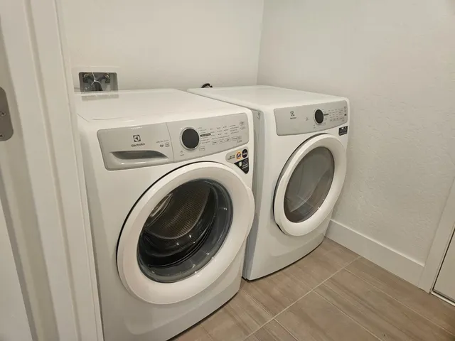 a view of a park with large trees