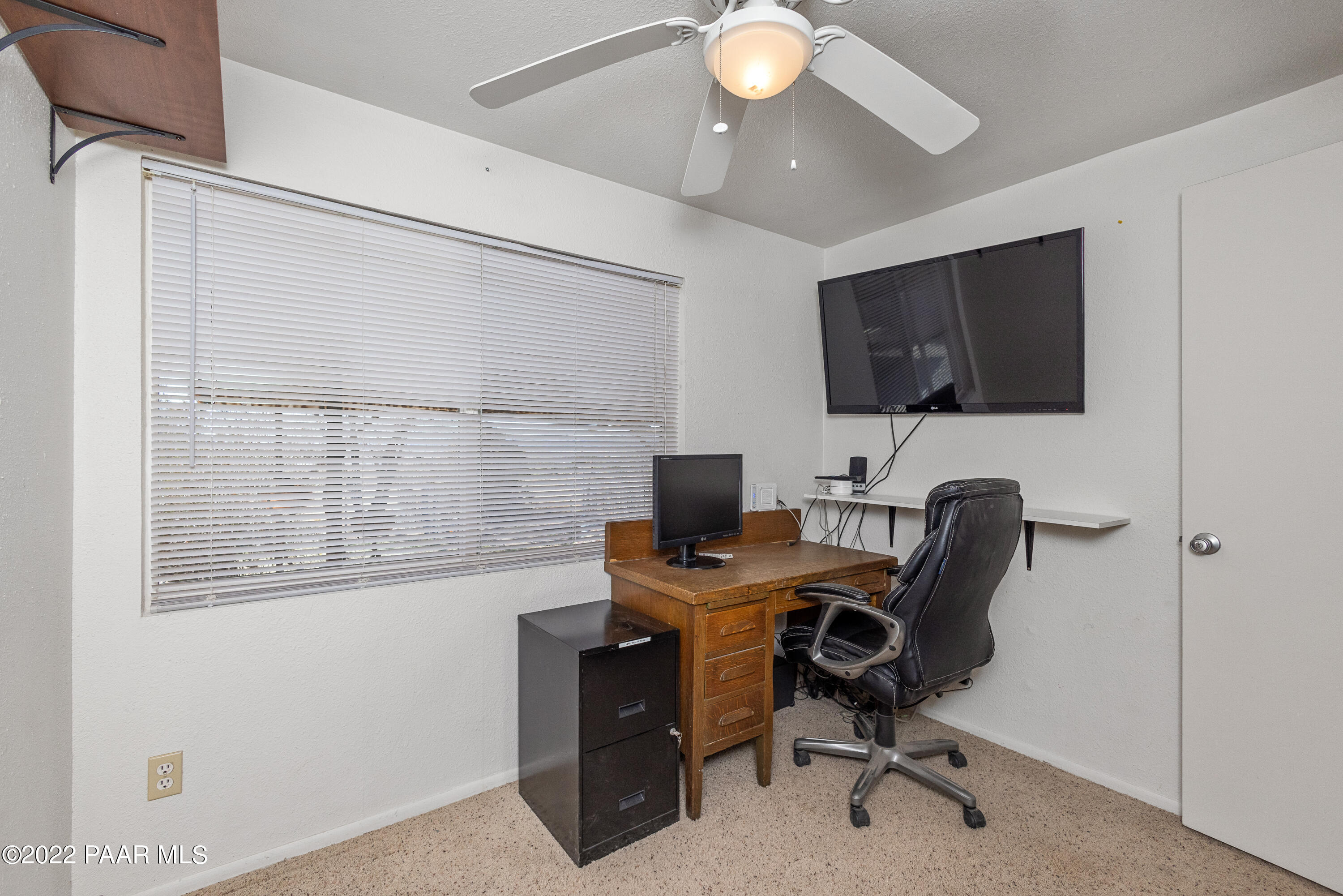 463 Antelope Run Road Paulden, AZ 86334 - Photo 16 of 26 a view of a workspace with a window