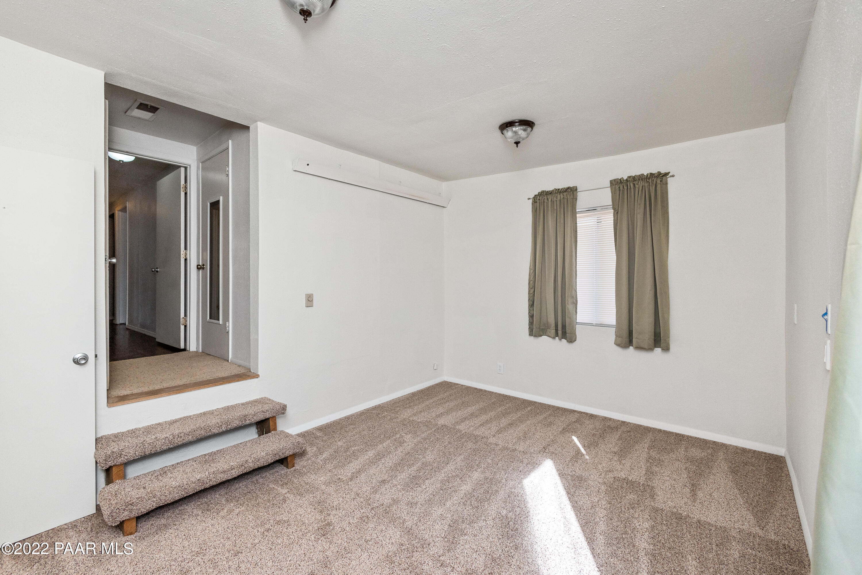 463 Antelope Run Road Paulden, AZ 86334 - Photo 18 of 26 a view of an empty room