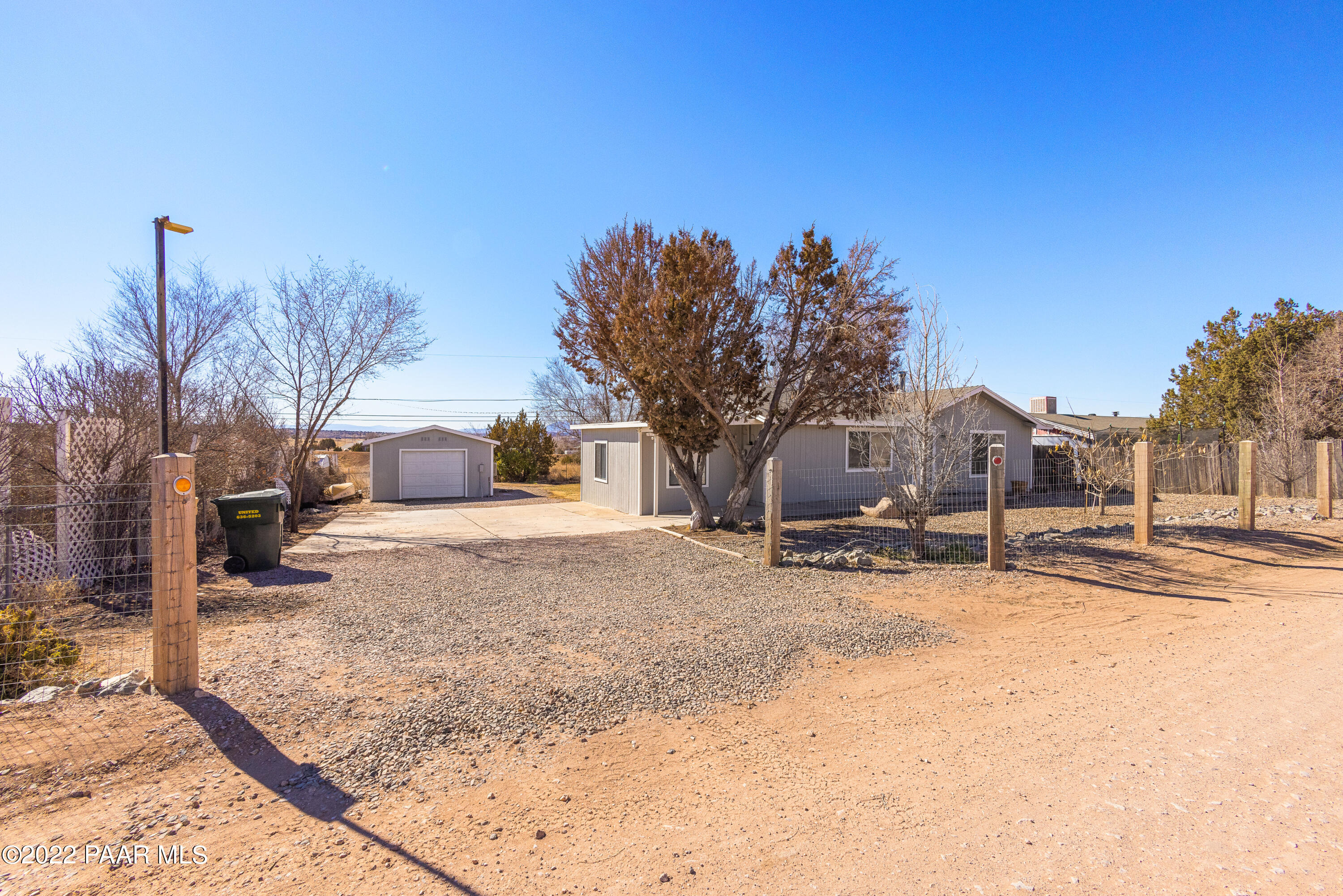 463 Antelope Run Road Paulden, AZ 86334 - Photo 2 of 26 a view of a house with snow on the road