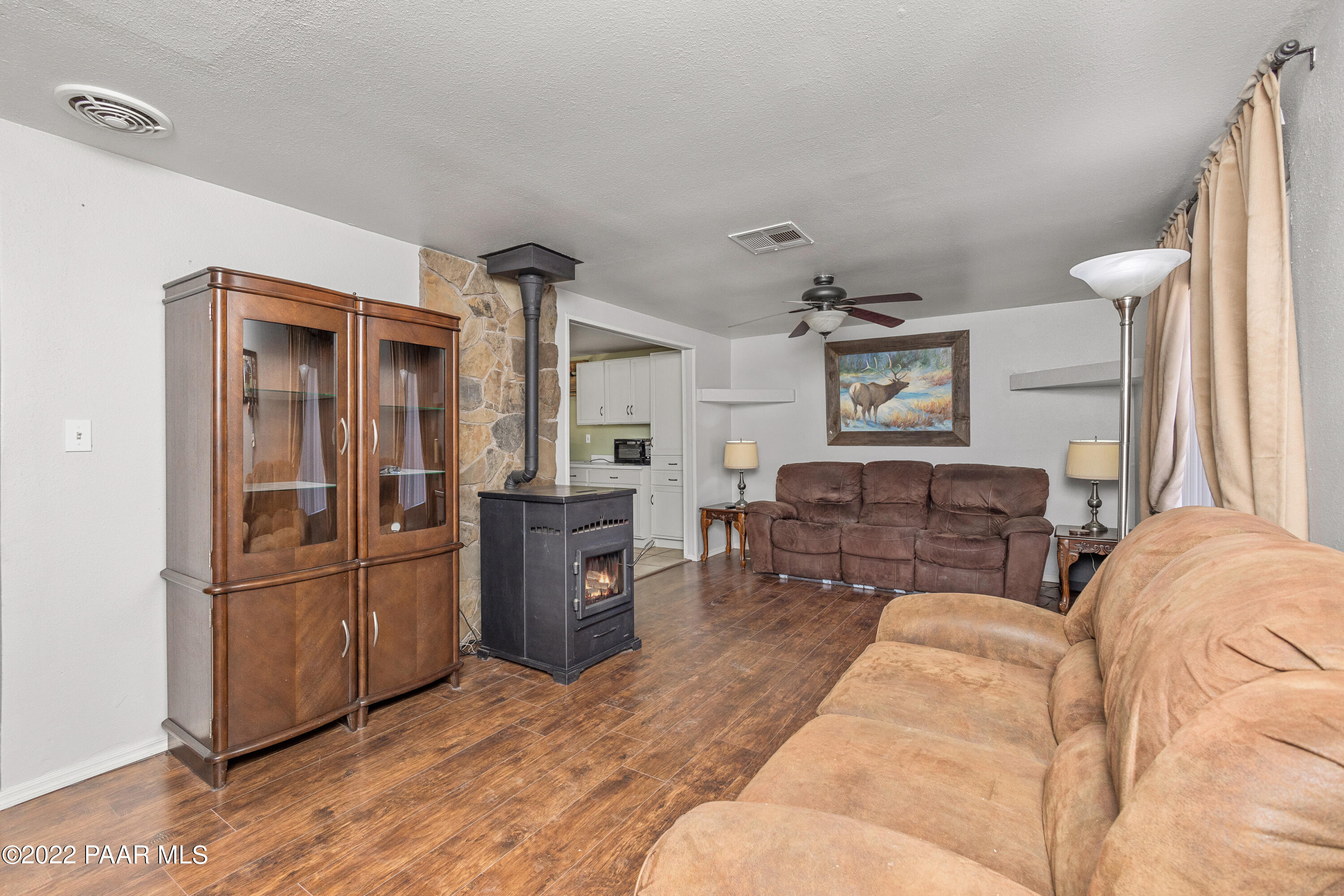 463 Antelope Run Road Paulden, AZ 86334 - Photo 5 of 26 a bed room with a bed and furniture