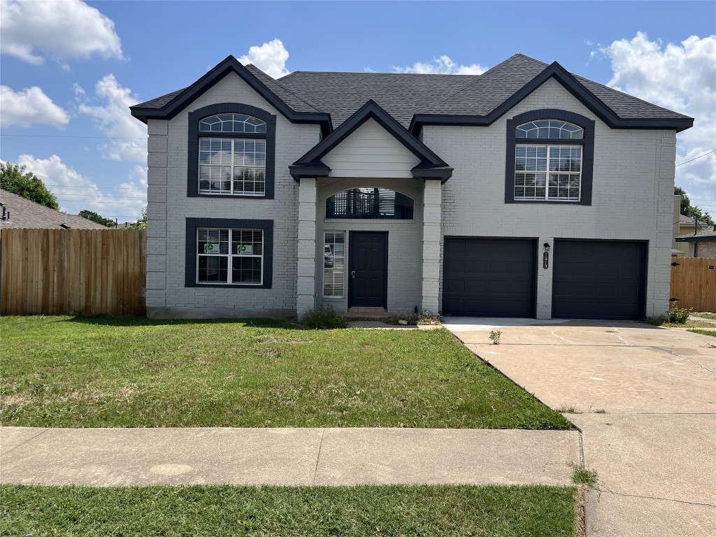 1613 Southeastern Trail Round Rock, TX 78664 - Photo 1 of 1 a front view of a house with a yard and garage