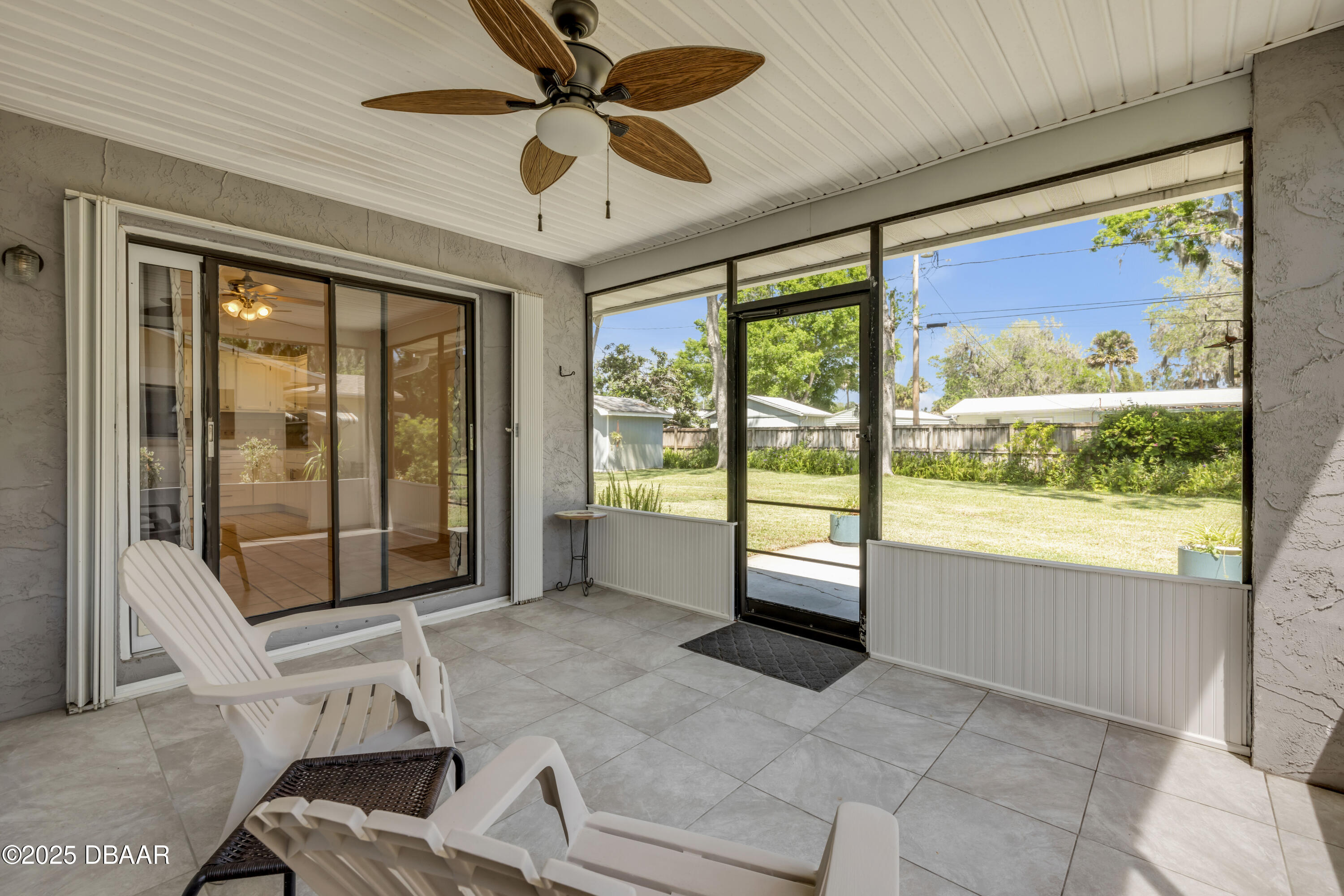 1851 Pine Tree Drive Edgewater, FL 32141 - Photo 17 of 29 a living room with a large window