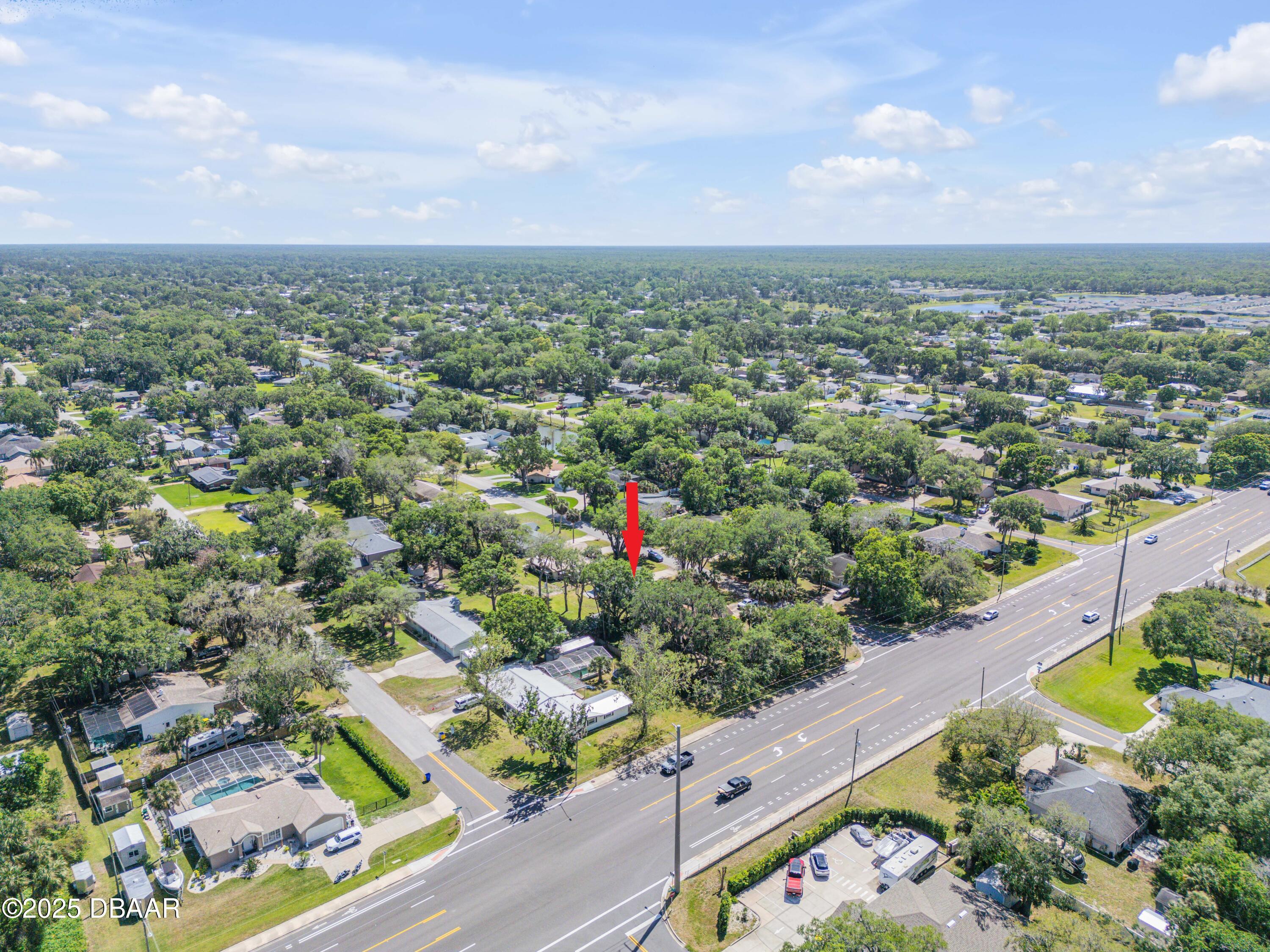 1851 Pine Tree Drive Edgewater, FL 32141 - Photo 28 of 29 an aerial view of residential houses with outdoor space