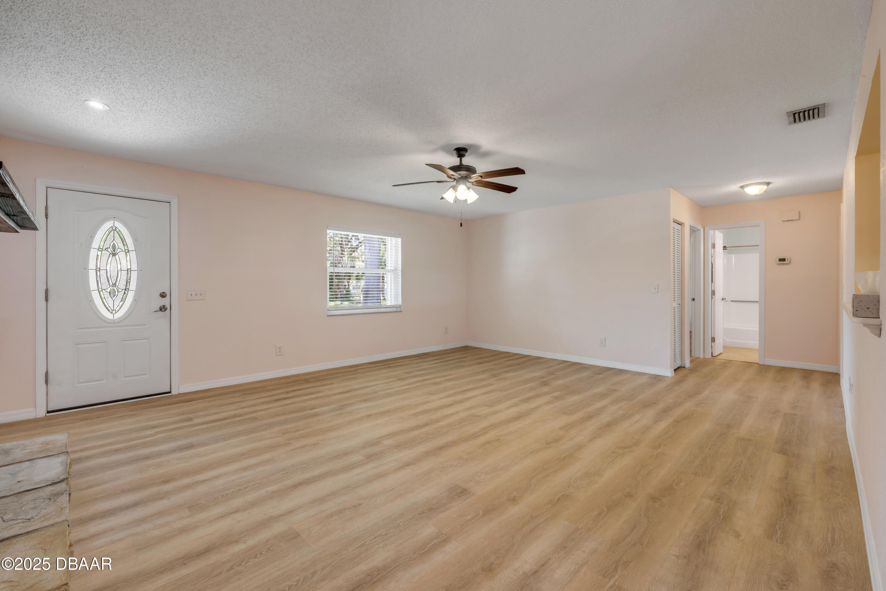 1851 Pine Tree Drive Edgewater, FL 32141 - Photo 3 of 29 a view of an empty room with a window