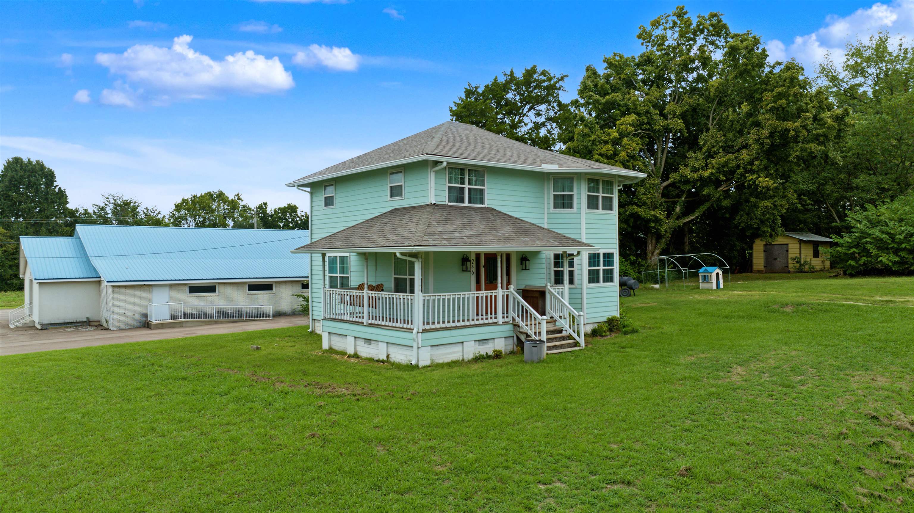 246 Cherryville Road Bells, TN 38006 - Photo 3 of 31 Two-story residence with a covered porch and white railing
