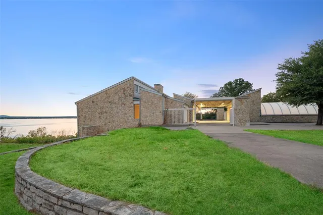 a view of a living room with a large window