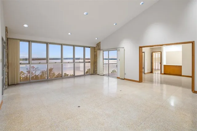 a kitchen with stainless steel appliances granite countertop a sink and cabinets
