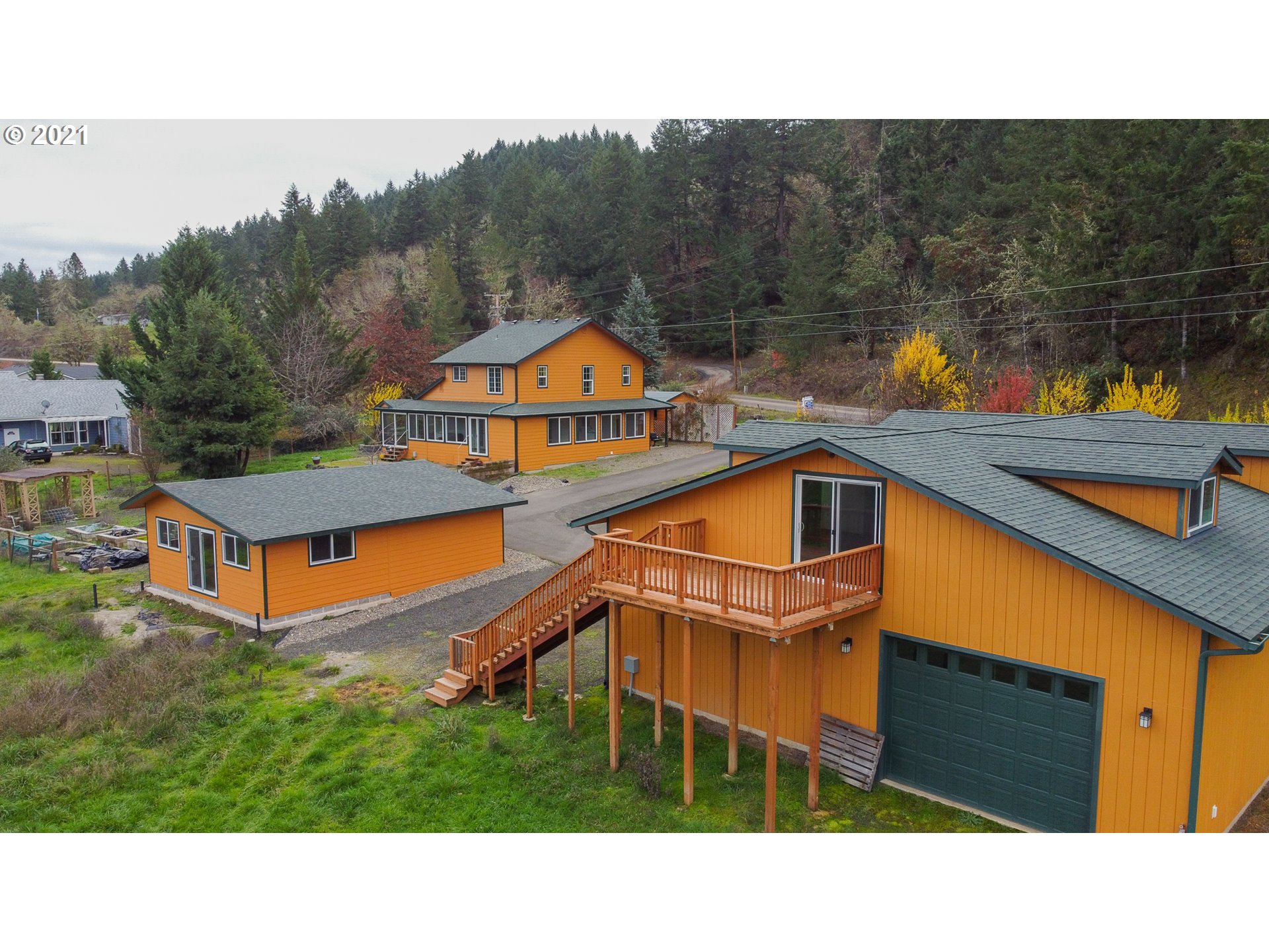 1579 South Side Road Sutherlin, OR 97479 - Photo 2 of 31 a backyard of a house with a yard and seating area