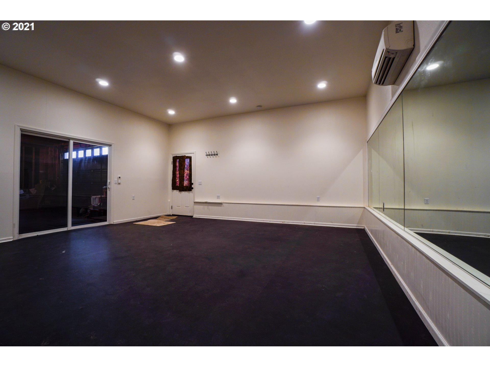 1579 South Side Road Sutherlin, OR 97479 - Photo 21 of 31 a view of an empty room with wooden floor