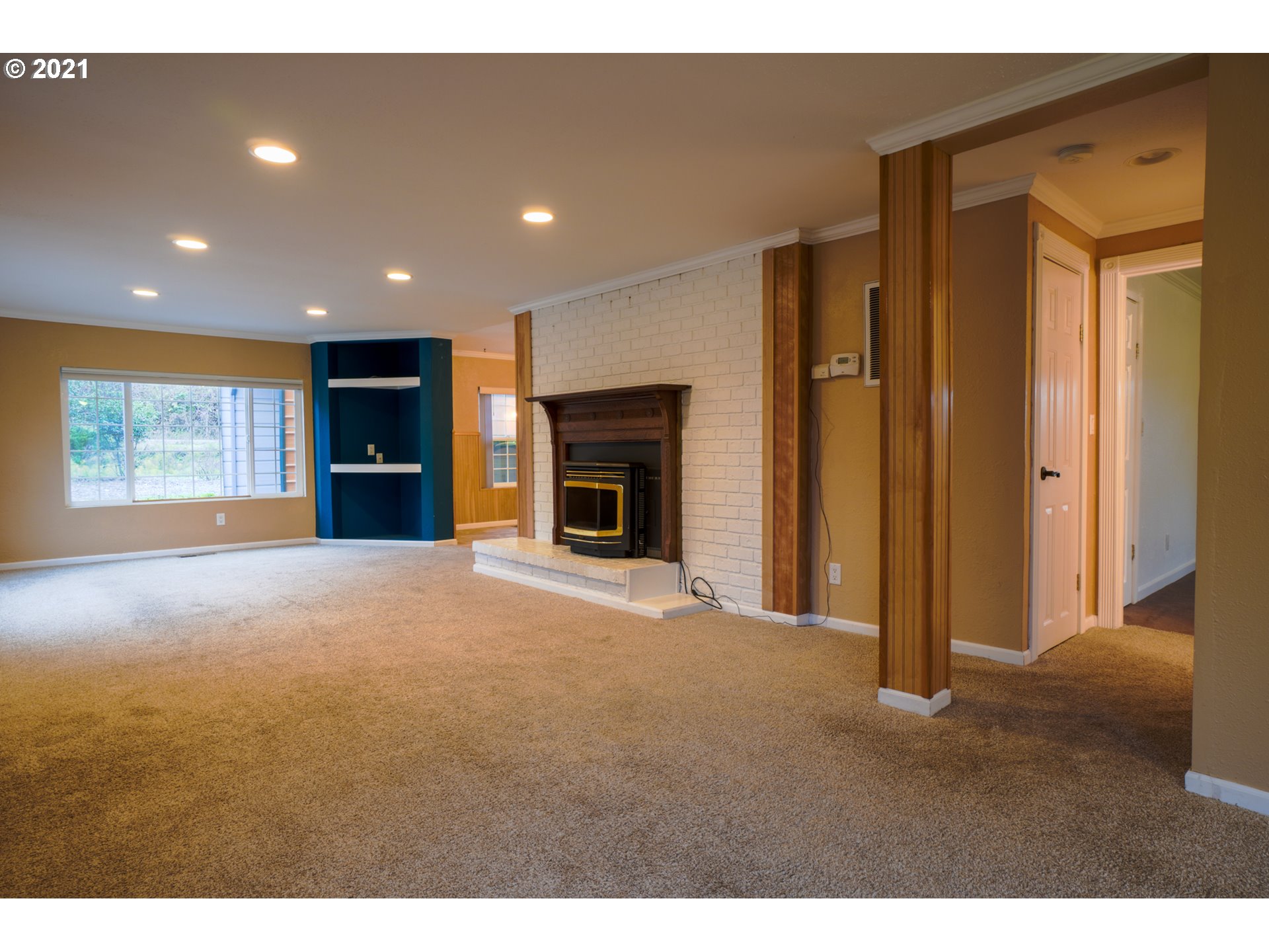 1579 South Side Road Sutherlin, OR 97479 - Photo 4 of 31 a view of empty room with a fireplace and fan