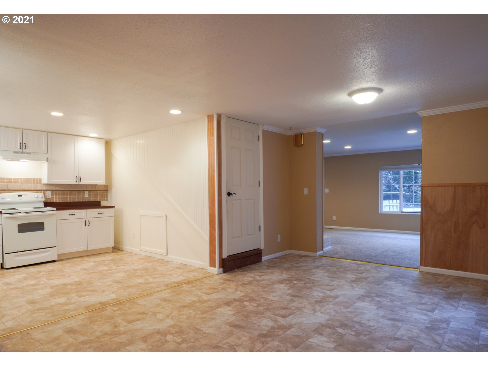 1579 South Side Road Sutherlin, OR 97479 - Photo 7 of 31 a view of a kitchen with a sink and a refrigerator