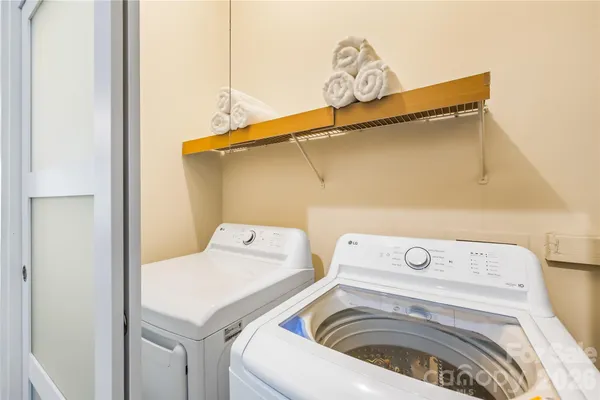 a utility room with dryer and washer