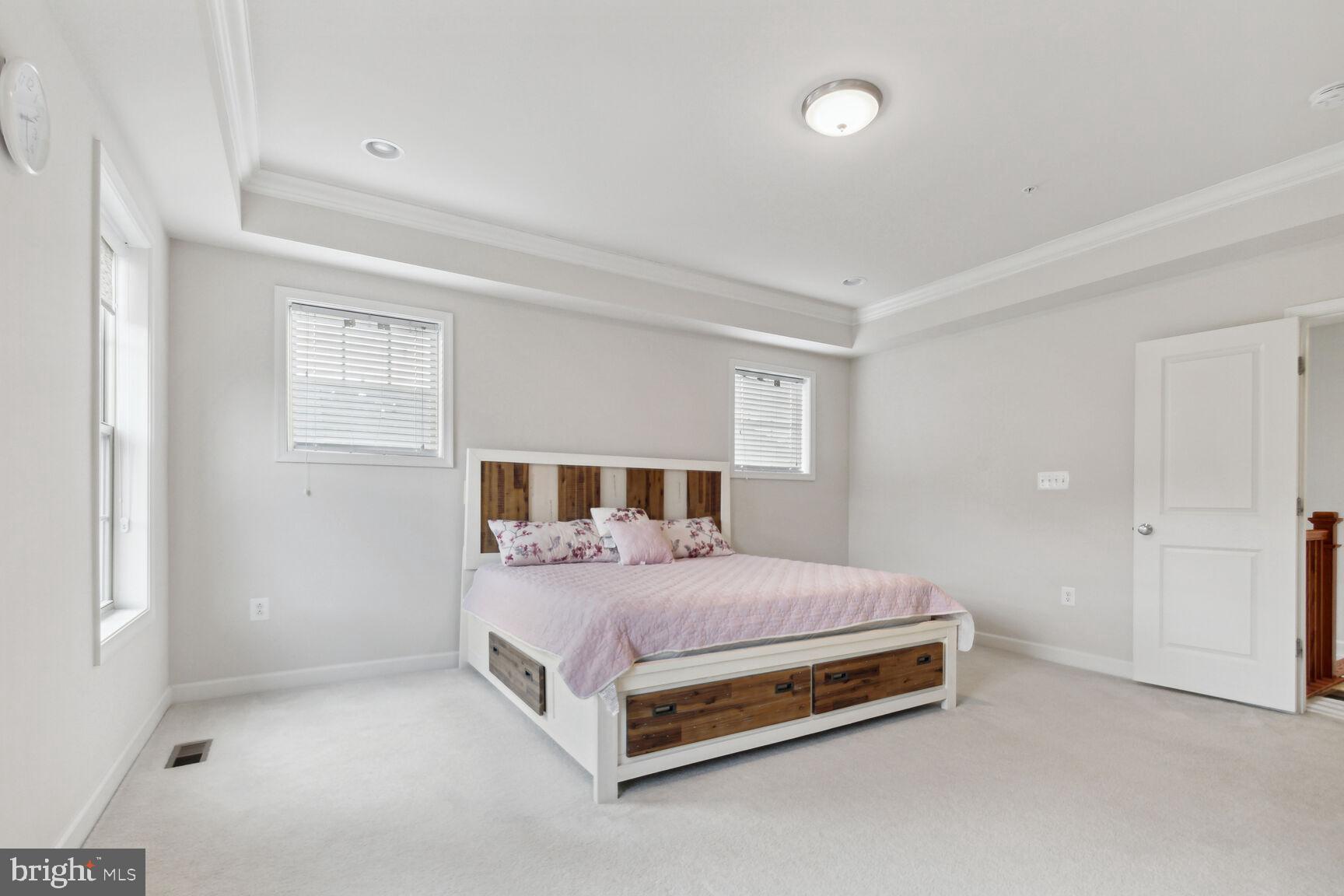 13601 Soaring Wing Lane Silver Spring, MD 20906 - Photo 15 of 53 a bedroom with a bed and window