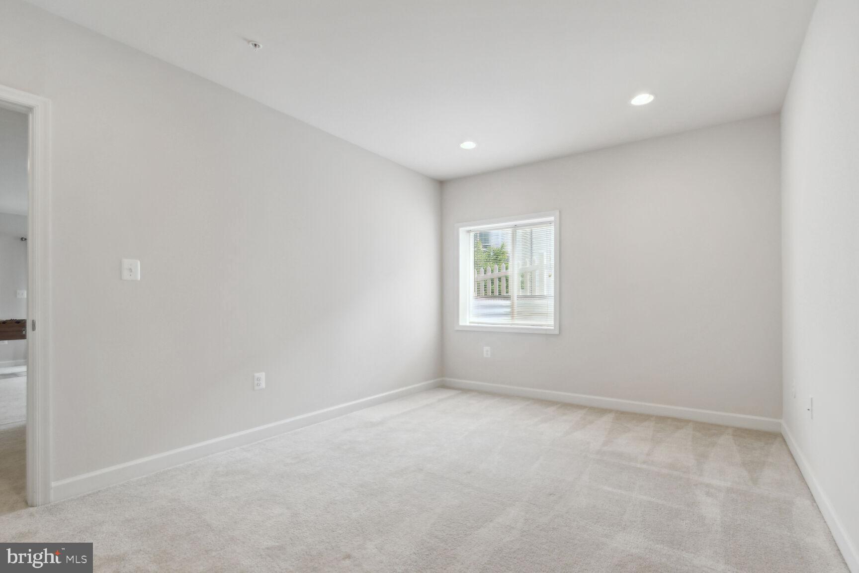 13601 Soaring Wing Lane Silver Spring, MD 20906 - Photo 21 of 53 an empty room with windows