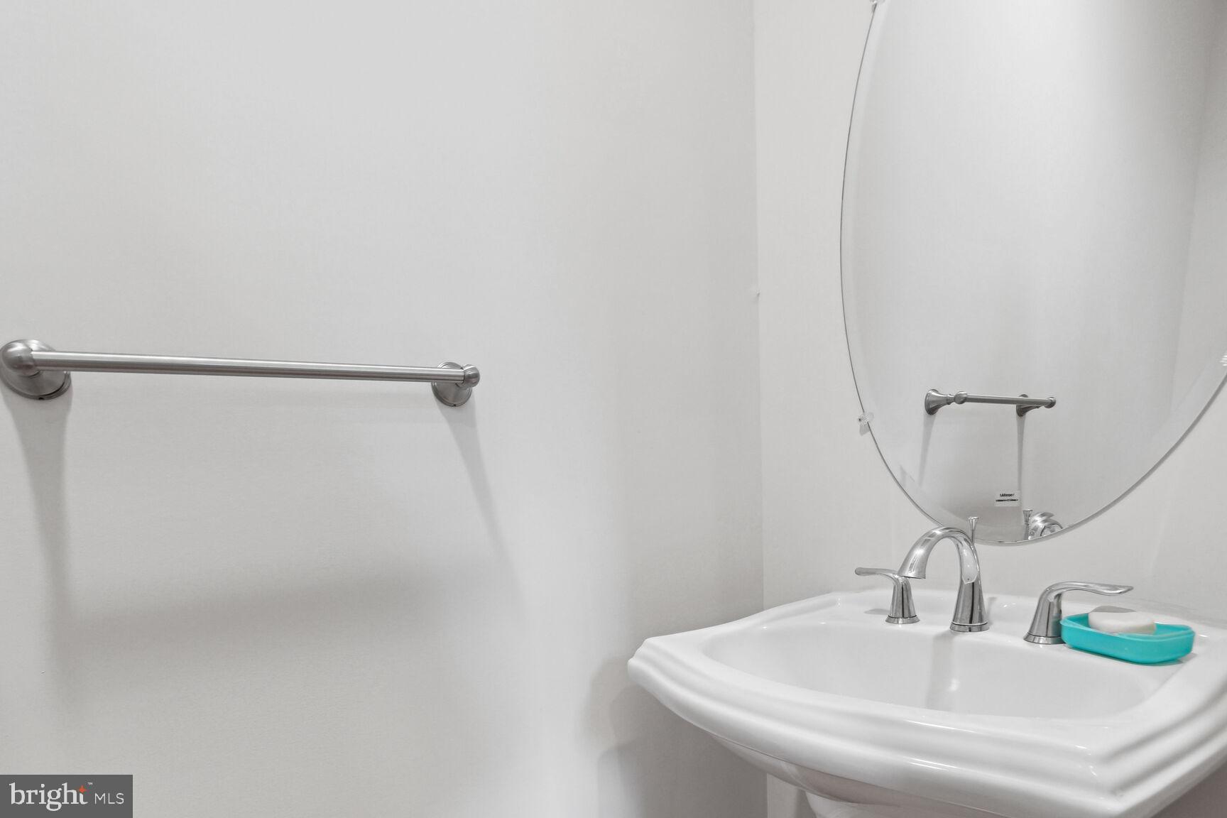 13601 Soaring Wing Lane Silver Spring, MD 20906 - Photo 24 of 53 a bathroom with a sink and a mirror
