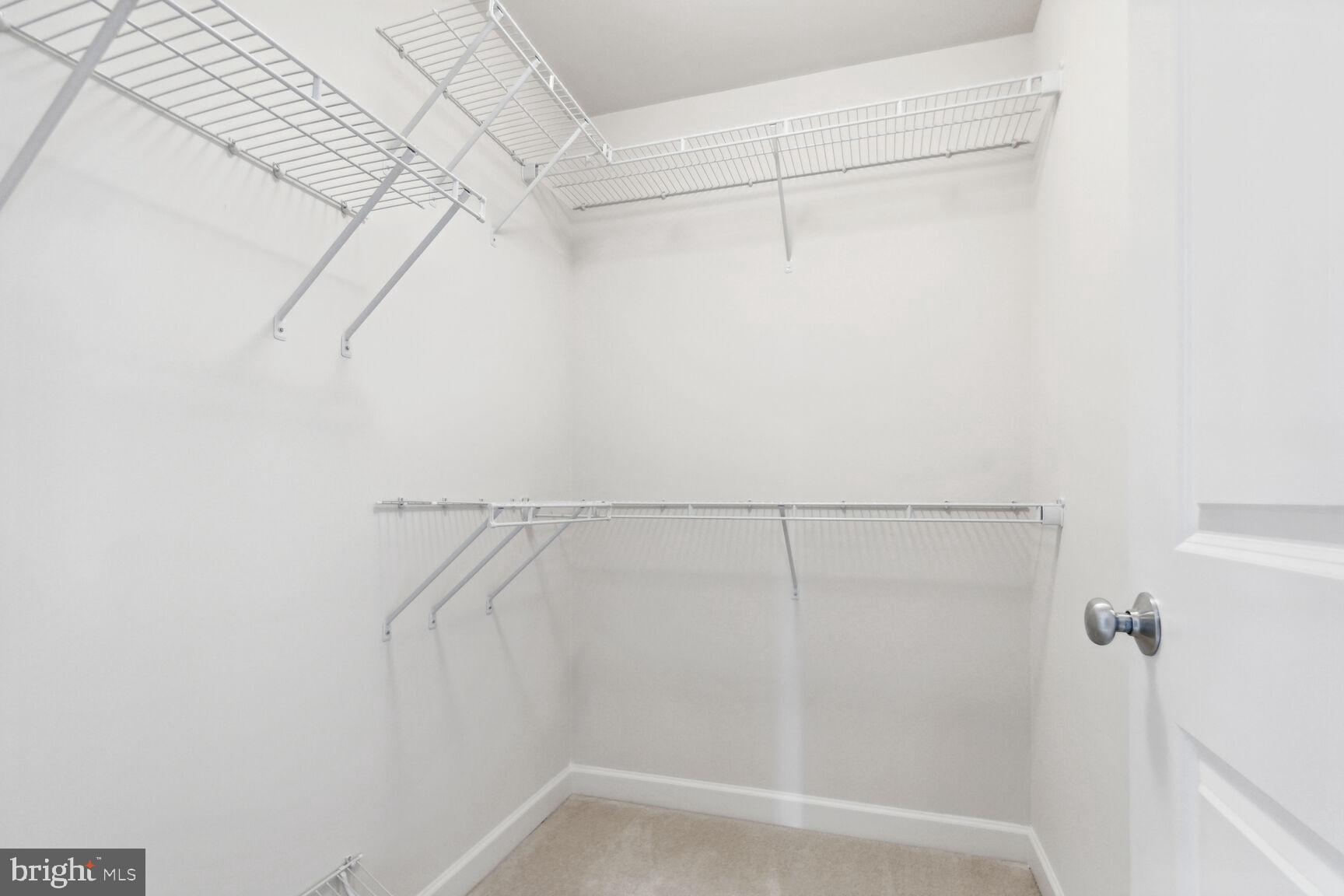 13601 Soaring Wing Lane Silver Spring, MD 20906 - Photo 27 of 53 a view of a room with racks on the wall