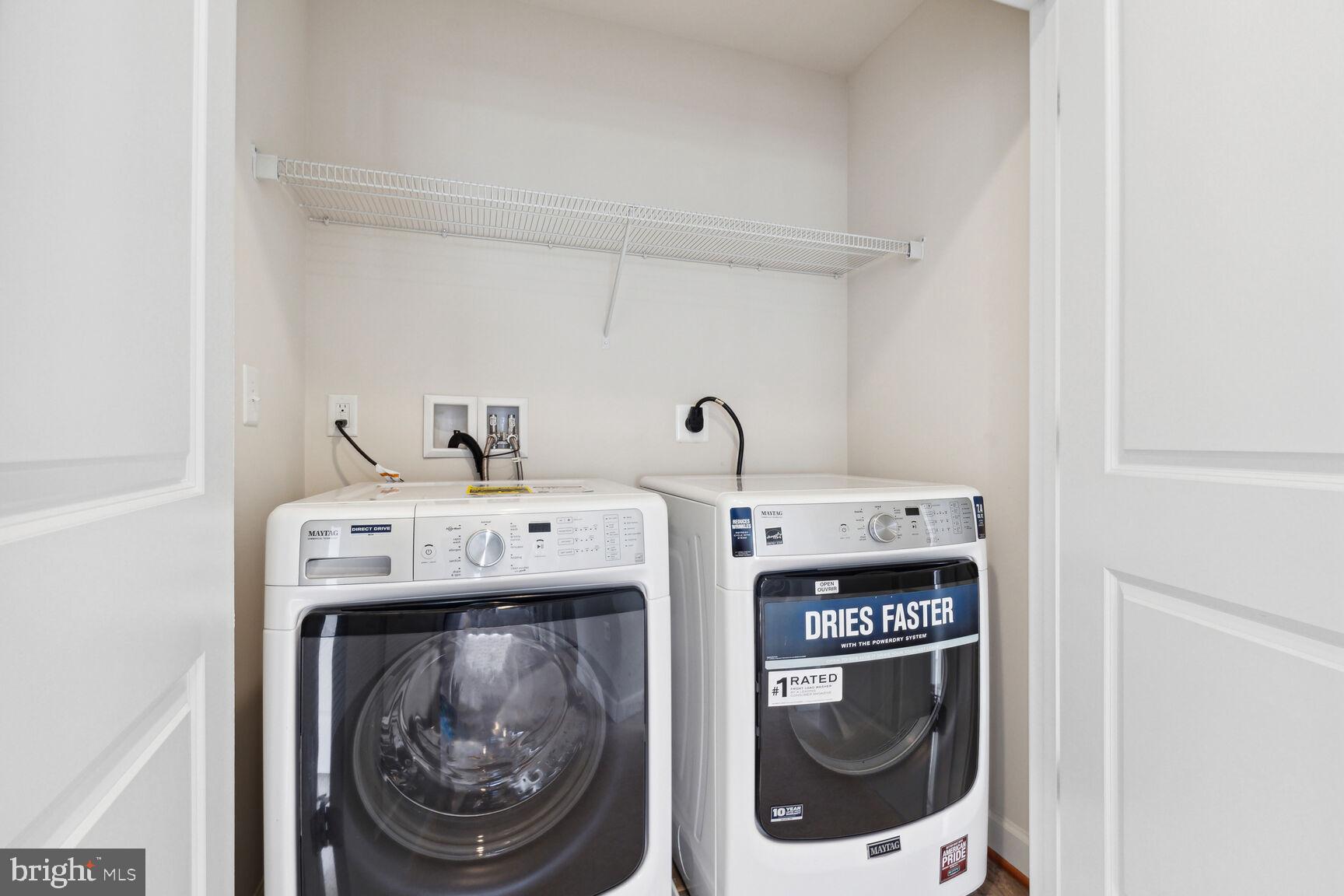 13601 Soaring Wing Lane Silver Spring, MD 20906 - Photo 33 of 53 a utility room with dryer and washer