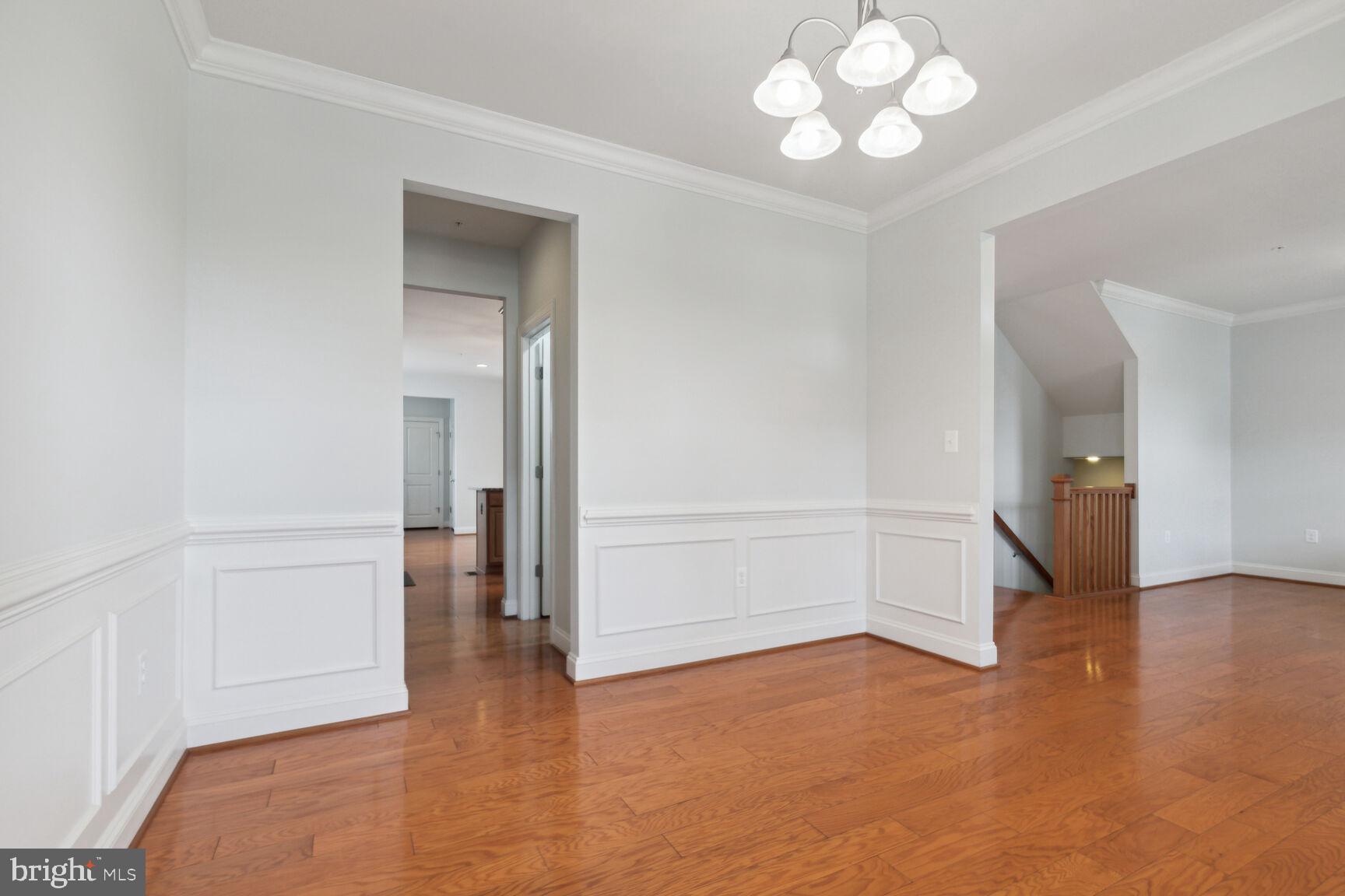 13601 Soaring Wing Lane Silver Spring, MD 20906 - Photo 6 of 53 wooden floor in an empty room with a window