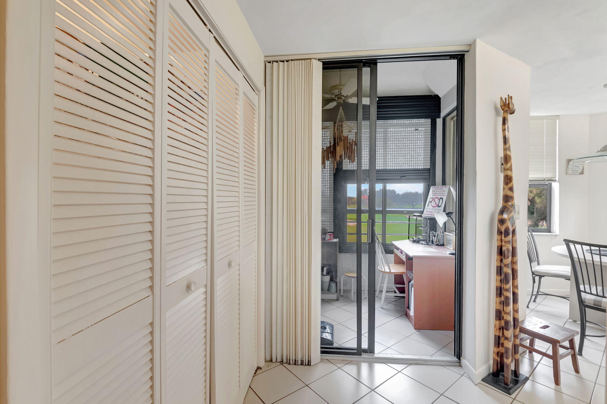 7460 La Paz Boulevard, Unit 206 Boca Raton, FL 33433 - Photo 11 of 37 Kitchen and patio