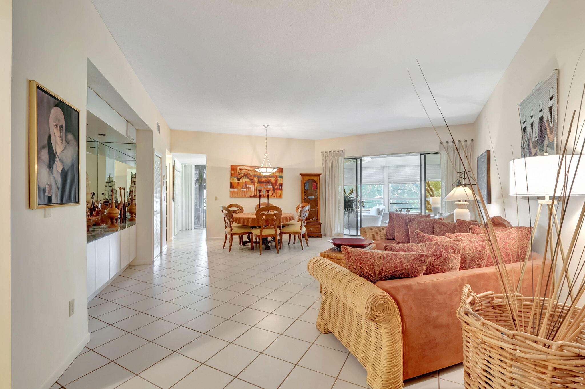 7460 La Paz Boulevard, Unit 206 Boca Raton, FL 33433 - Photo 5 of 37 Entry and Living room