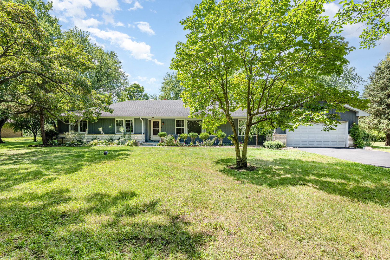 158 South Ela Road Barrington, IL 60010 - Photo 2 of 21 a swimming pool with outdoor seating and yard