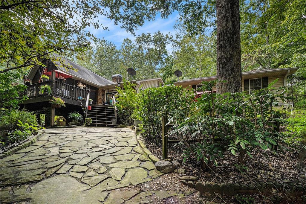 2170 Taylorsville Road Taylorsville, GA 30178 - Photo 23 of 48 a pathway of a house with a tree