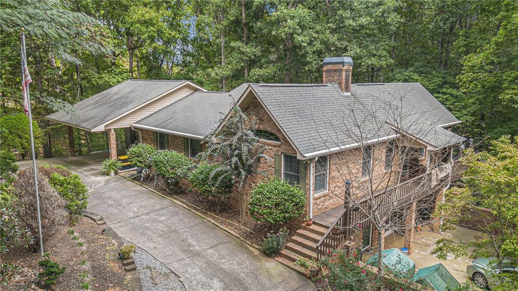 2170 Taylorsville Road Taylorsville, GA 30178 - Photo 24 of 48 a house with trees in front of it