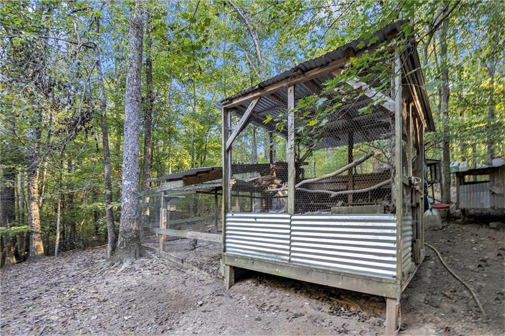 2170 Taylorsville Road Taylorsville, GA 30178 - Photo 40 of 48 a view of a house with a yard