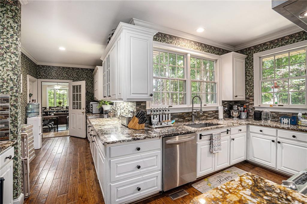 2170 Taylorsville Road Taylorsville, GA 30178 - Photo 5 of 48 a kitchen with a sink window and cabinets