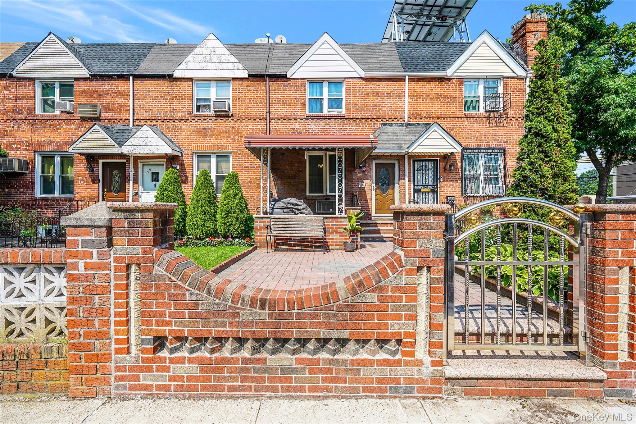 141 Branton Street Brooklyn, NY 11236 - Photo 1 of 20 a front view of a house with garden
