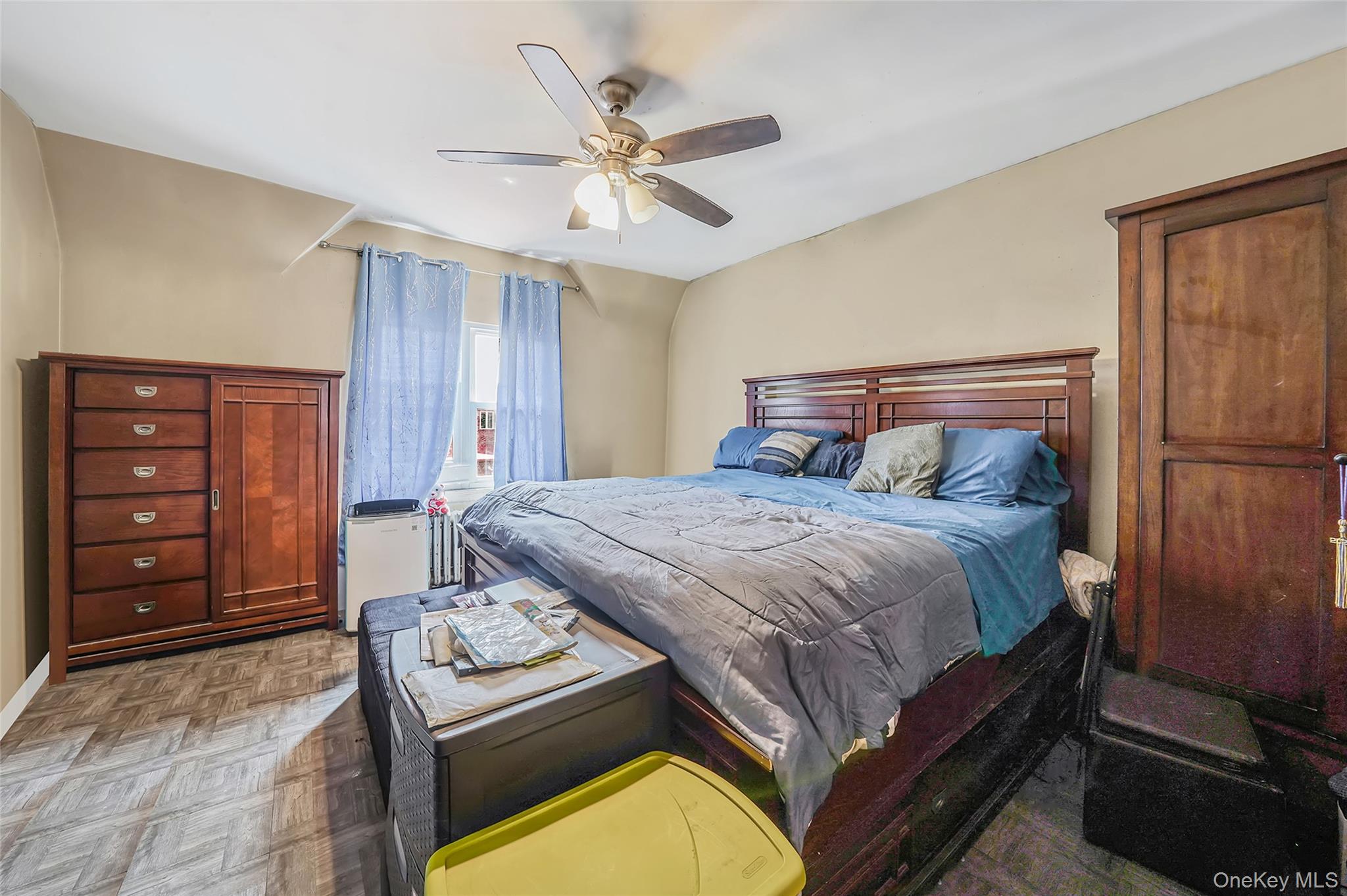 141 Branton Street Brooklyn, NY 11236 - Photo 11 of 20 a bedroom with a bed and a dresser
