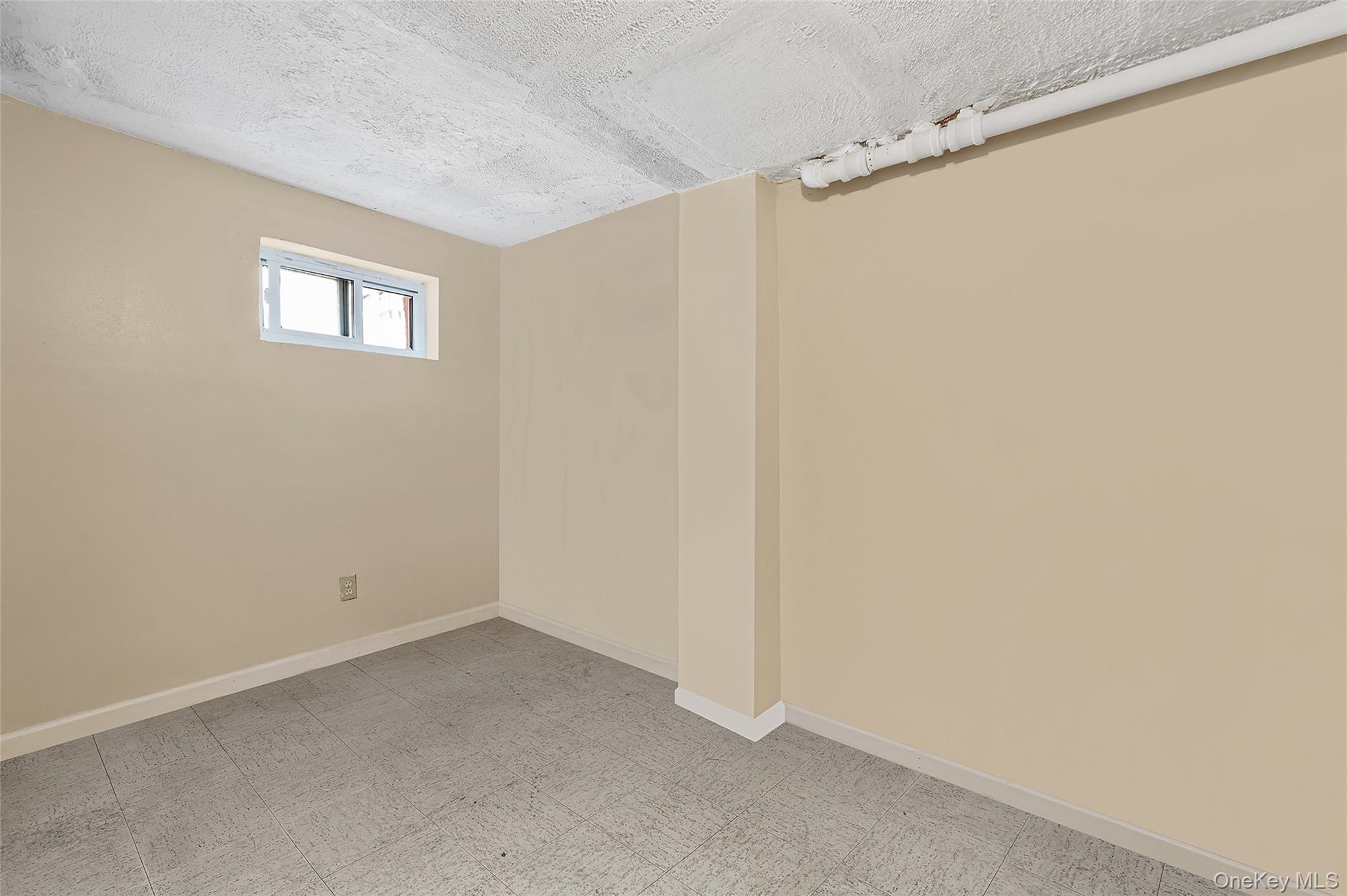 141 Branton Street Brooklyn, NY 11236 - Photo 16 of 20 a view of a small space with window