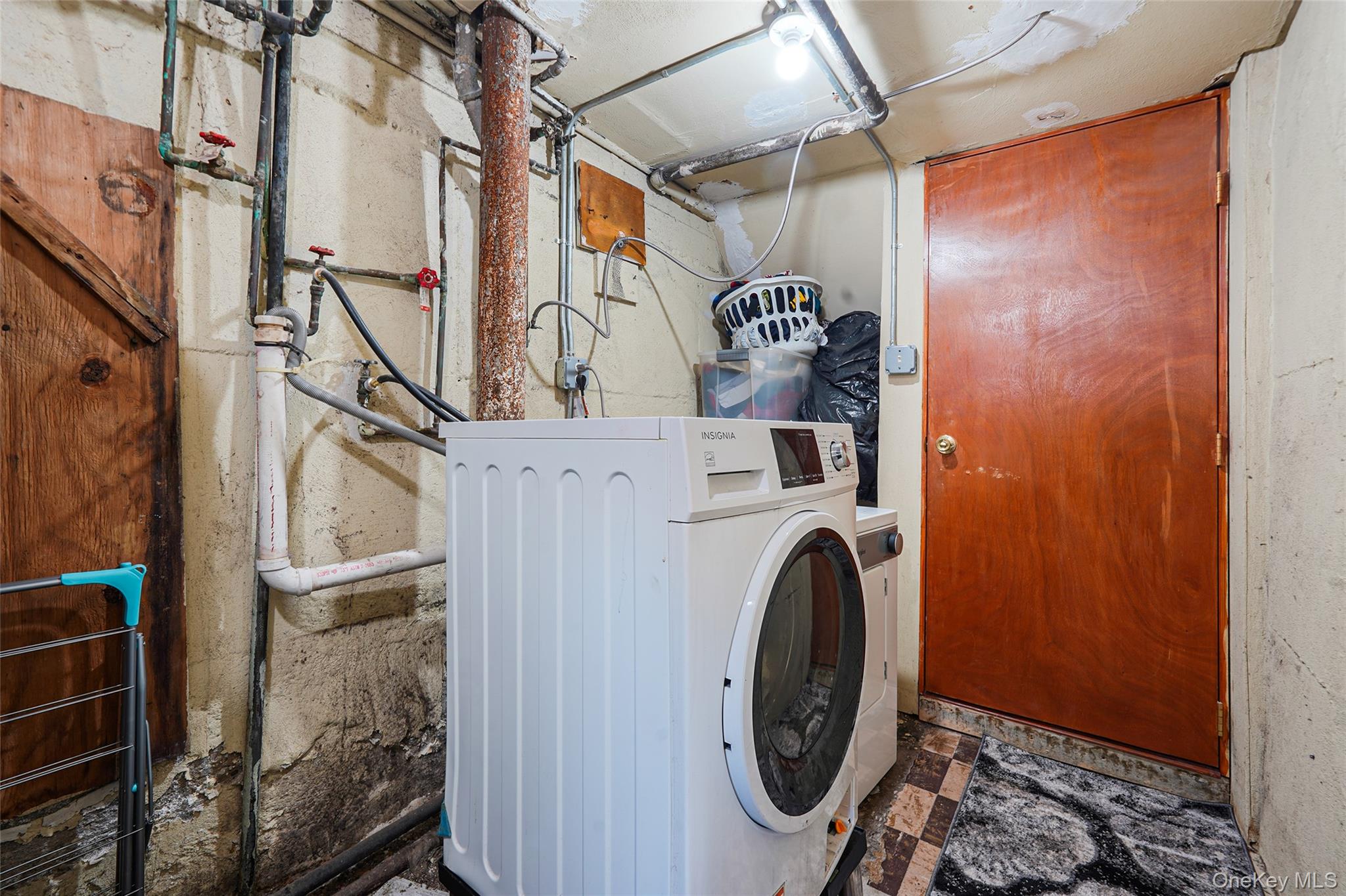 141 Branton Street Brooklyn, NY 11236 - Photo 18 of 20 a utility room with dryer and washer