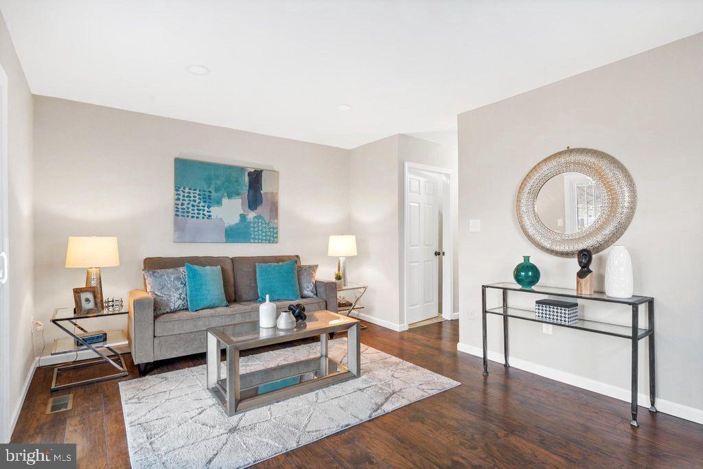 424 53rd Street Southeast Washington, DC 20019 - Photo 14 of 40 a living room with furniture and a chandelier