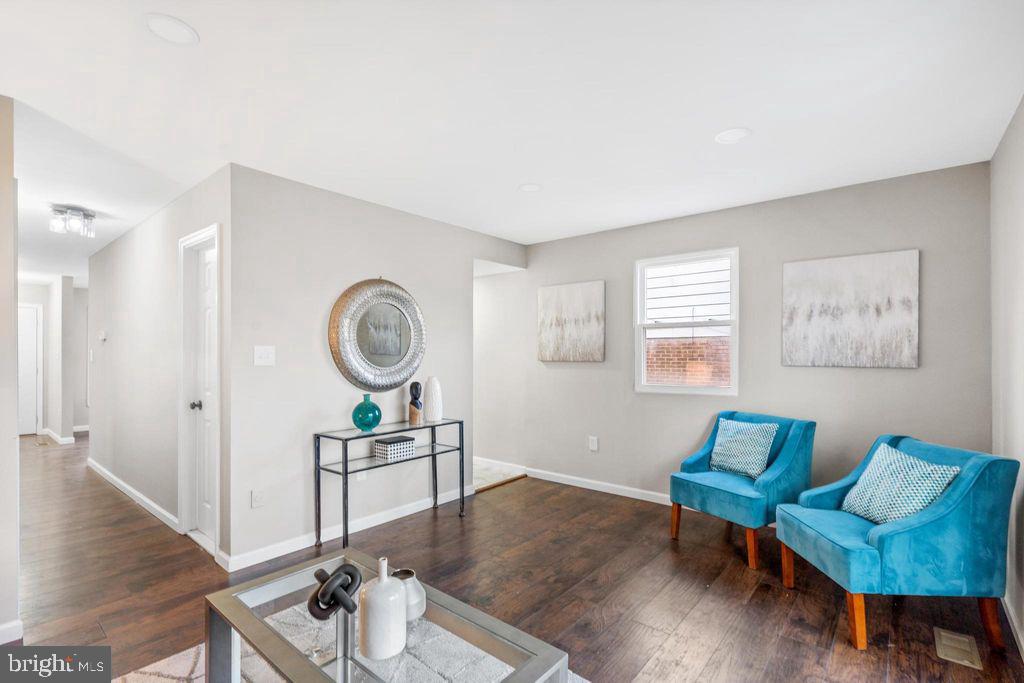 424 53rd Street Southeast Washington, DC 20019 - Photo 17 of 40 a living room with furniture and a wooden floor