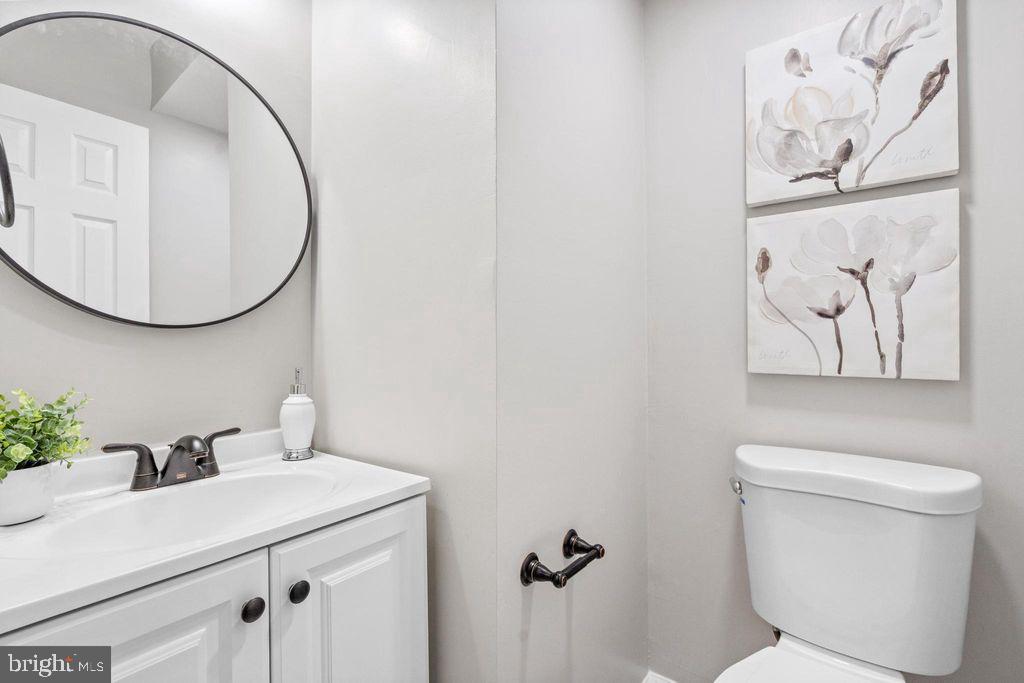 424 53rd Street Southeast Washington, DC 20019 - Photo 18 of 40 a bathroom with a toilet and a sink