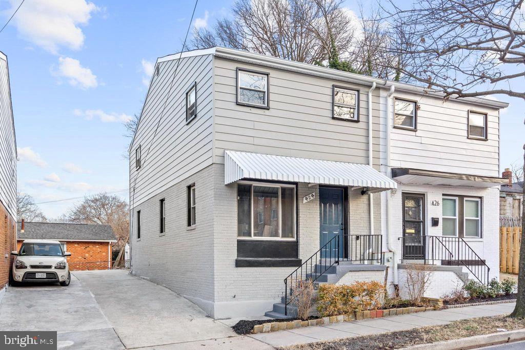 424 53rd Street Southeast Washington, DC 20019 - Photo 2 of 40 a front view of a house with parking