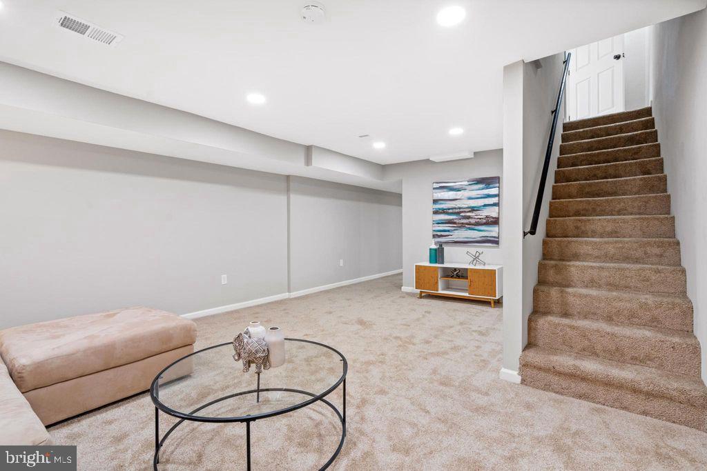 424 53rd Street Southeast Washington, DC 20019 - Photo 31 of 40 a view of a livingroom with furniture and staircase
