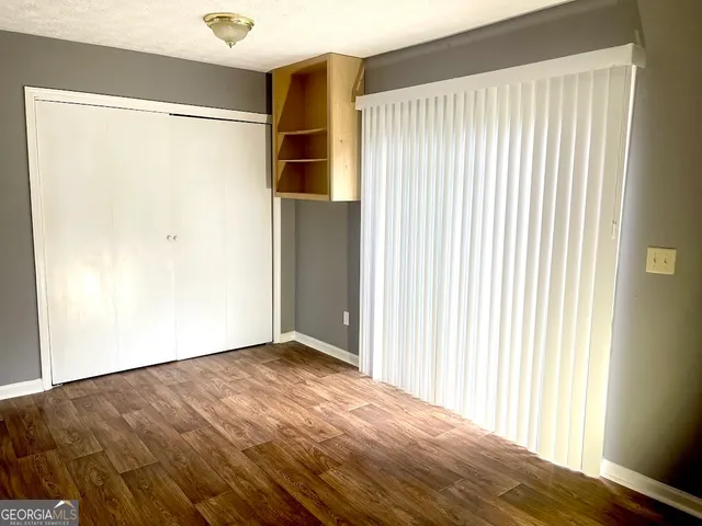 a kitchen with stainless steel appliances granite countertop a refrigerator sink and cabinets