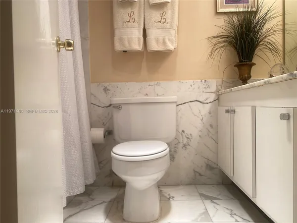 a view of a large building with a yard