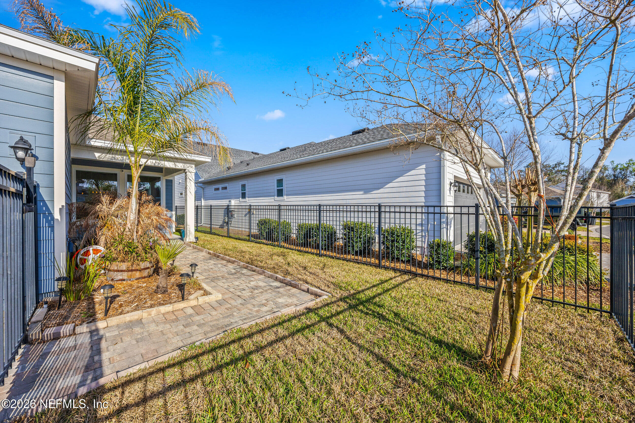 73 Bluebonnet Way Street St. Augustine, FL 32092 - Photo 27 of 48 Fenced Backyard w Paver Walkway